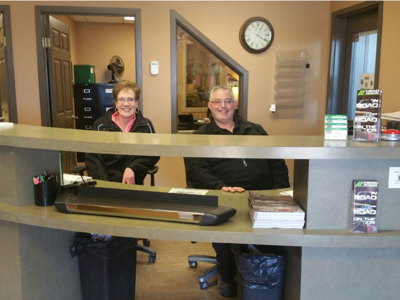 Joe and Louise at front desk